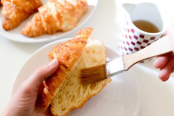 Perfect Almond Croissants: Brushing syrup