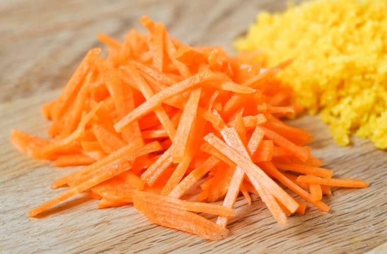 Carrots cut with a mandoline slicer.